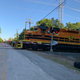 Some get annoyed when a train comes. Not me. I like to count the cars. This one only had ten!